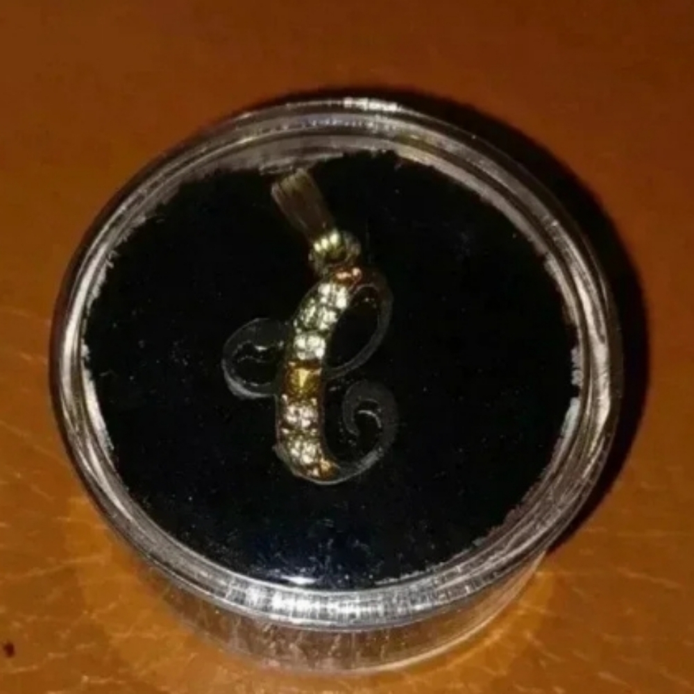 Gold plated letter pendant "E" with faux diamonds